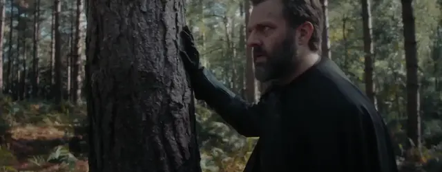 Baylan, a hand on a pine